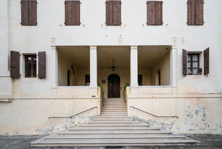 entrance in the side palace of the medieval abbey of Sesto al Reghena, Friuli Venezia Giulia region, Italyのeditorial素材