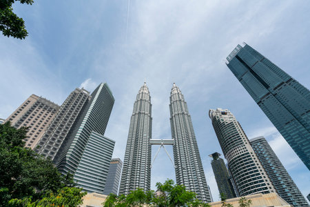 A view of KLCC park with the Petronas Towers in the background in Kuala Lumpur, Malaysiaのeditorial素材