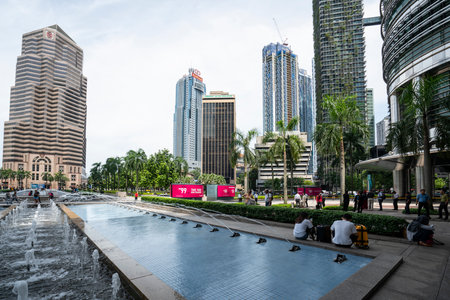 A view of the fountains among the skyscrapers in Kuala Lumpur, Malaysiaのeditorial素材