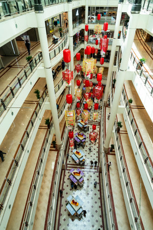 view of Suria KLCC shopping mall with commemorative decorations of Chinese new year in Kuala Lumpur, Malaysiaのeditorial素材