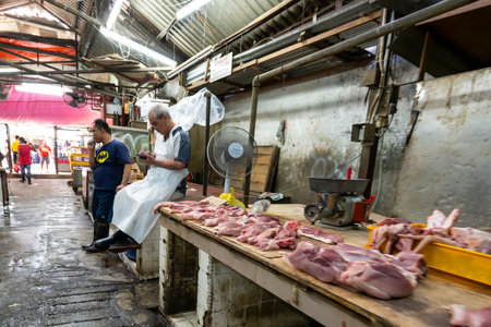 meat seller in the street in Chinatown in Kuala Lumpur, Malaysiaのeditorial素材