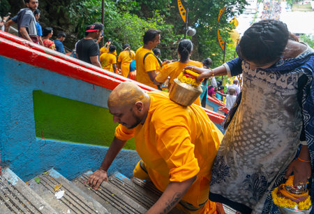Kuala Lumpur, Malaysia. January 2019.  faithful who climb the long stairway leading to the temples at Batu Cavesのeditorial素材