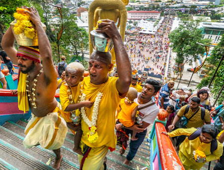 Kuala Lumpur, Malaysia. January 2019.  faithful who climb the long stairway leading to the temples at Batu Cavesのeditorial素材