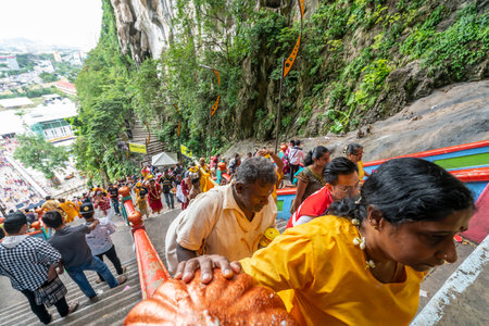 Kuala Lumpur, Malaysia. January 2019.  faithful who climb the long stairway leading to the temples at Batu Cavesのeditorial素材