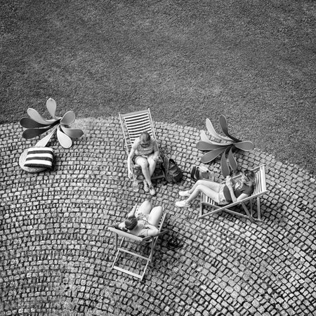 Ljubljana, Slovenia. August 3, 2019.   some people relax on the lawn at the castle of the cityのeditorial素材