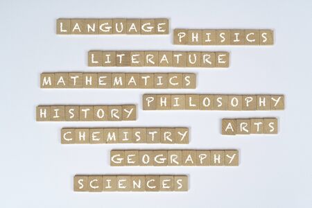 concepts of subjects of study on wooden tilesの写真素材