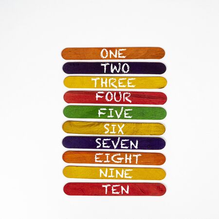 the numeration from one to ten on coloured wooden slatsの写真素材