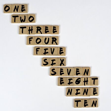 the numeration from one to ten on  wooden tilesの写真素材