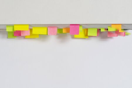 a book with some colored bookmarks