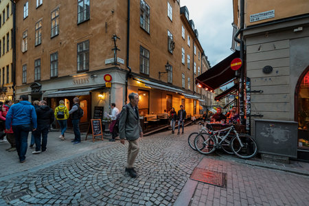 Stockholm, Sweden. September 2019.   view of the typical old streets and shops of the city center at sunsetのeditorial素材