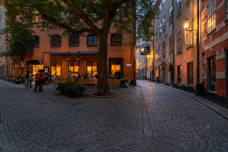 Stockholm, Sweden. September 2019.   view of the typical old streets and shops of the city center at sunsetのeditorial素材