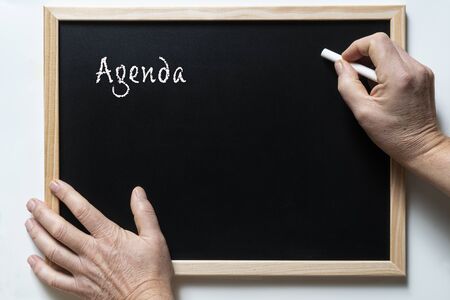 a blackboard with written the word newsの写真素材