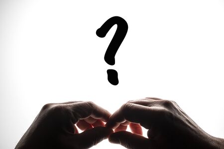 the doubt for choosing on a backlit surfaceの写真素材