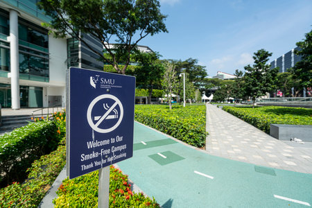 Singapore.  January 2020.  the no smoking sign in the park of  Li Ka Shing Library building of...