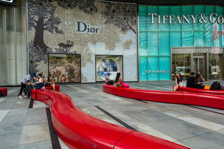 Singapore, January 2020.  the stores in front of the entrance of ION Orchard shopping mall.のeditorial素材