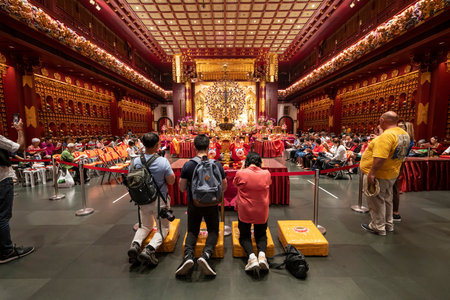 Singapore. January 2020.  The faithful pray in Buddha Tooth Relic Templeのeditorial素材