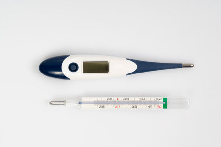 a thermometer for measuring analog and digital body temperatureのeditorial素材