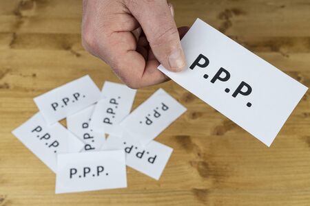 a man gives up on the  paycheck protection programの写真素材