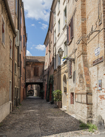 Ferrara, Italy. August 6, 2020. the clock tower in the cathedral square in ferrara, italyのeditorial素材