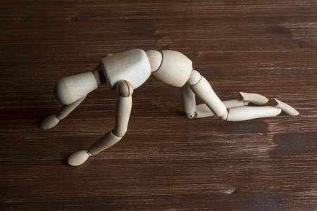 a wooden dummy as he stands upの写真素材