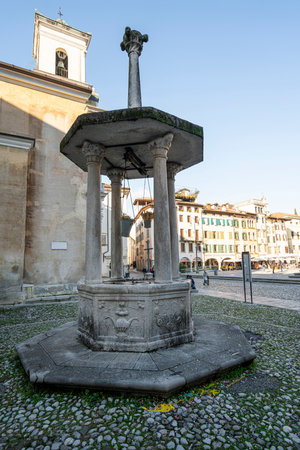 Udine, Italy. February 11, 2020. Diogenes lantern (the Diogene lantern) ancient well in St. James squareのeditorial素材
