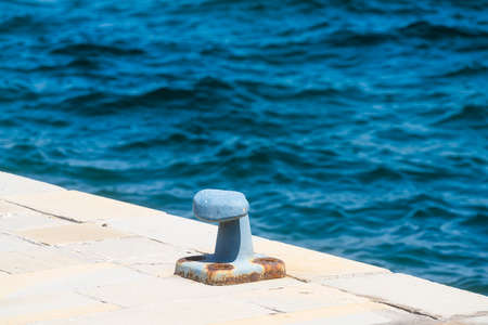 Muggia, Italy. June 13, 2021. detail view of a bollard on the pierの写真素材