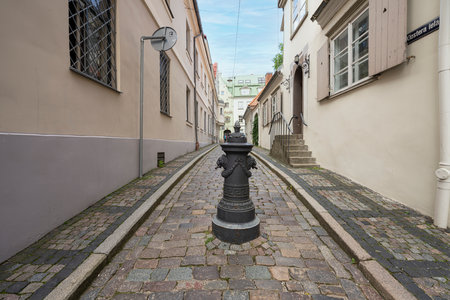 Riga, Latvia. August 2021. An alley between the old houses of the historic city center