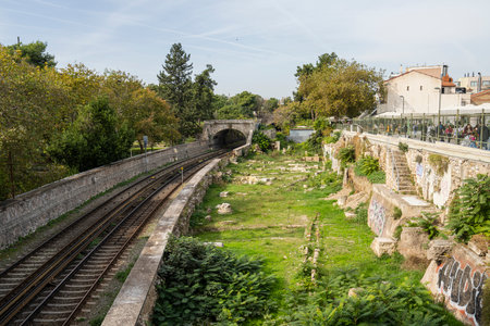 Athens, Greece. November 2021. The tracks of the metro line crosses the anciernt Agora archaeological site in the city centerのeditorial素材