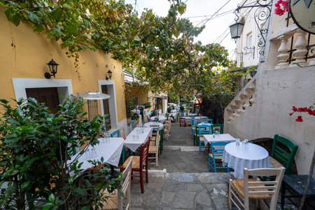 Athens, Greece. November 2021. the typical open-air trattorias on the narrow streets of the city centerのeditorial素材