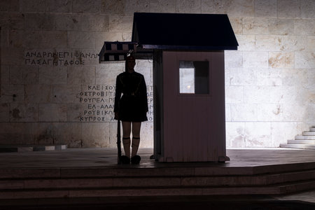 Athens, Greece. November 2021. the Evzones guard in front of the tomb of the unknown soldier at the greek parliament buildingのeditorial素材