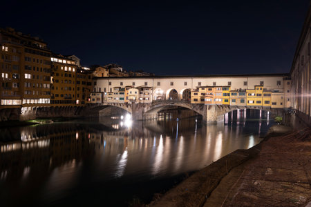 Florence, Italy. January 2022. a night view of hte Ponte Vecchio on the Arno river in the city centerのeditorial素材