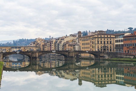 Florence, Italy. January 2022. Santa Trinita bridge on the Arno river is a refined three-arch bridge designed by Bartolomeo Ammanatiの写真素材