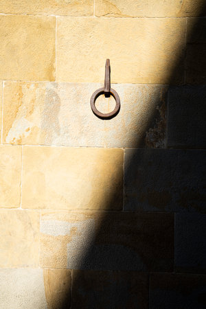 Florence, Italy. January 2022. the iron rings to tie the horses on the walls of the medieval buildings in the city centerのeditorial素材
