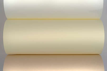 close up of a rolled up dyed sheet of paper
