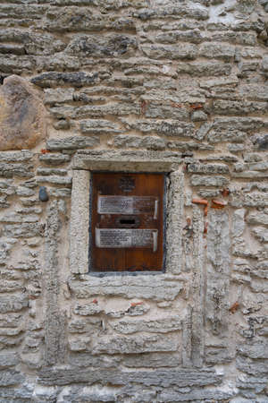 Tallinn, estonia. July 2022. view of the hole where to introduce one's prayers requests at the Ukrainian Greek Catholic Church in Estonia Tallinn parish in the city centerのeditorial素材