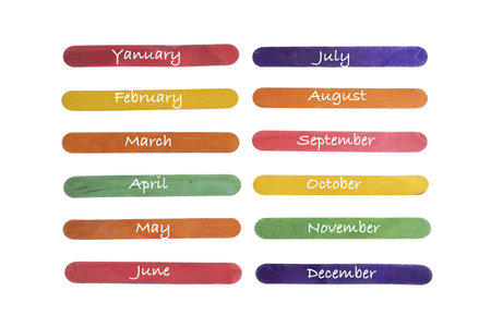the months of the year written on colored wooden palettes on a transparent backgroundの写真素材