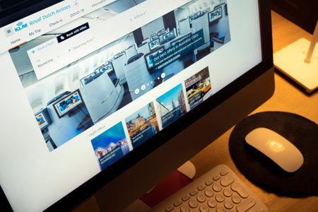 View of KLM, Royal Dutch Airlines web site on the computerのeditorial素材