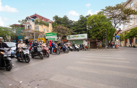Hanoi, Vietnam, January 2023. Hanoi, Vietnam, January 2023. the chaotic traffic of mopeds in the streets of the city centerのeditorial素材