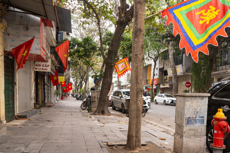 Hanoi, Vietnam, January 2023. the Vietnamese flags hung along the streets of the city centreのeditorial素材
