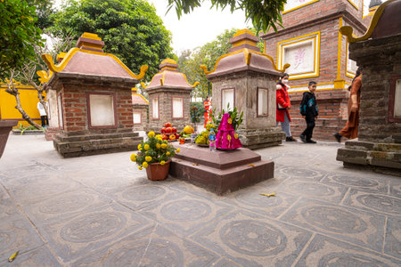 Hanoi, Vietnam, January 2023. the faithful within the Tran Quoc Pagoda, the oldest Buddhist temple in Hanoi, is located on a small island near the southeastern shore of Hanoi's West Lake.のeditorial素材