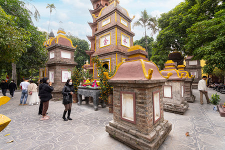 Hanoi, Vietnam, January 2023. the faithful within the Tran Quoc Pagoda, the oldest Buddhist temple in Hanoi, is located on a small island near the southeastern shore of Hanoi's West Lake.のeditorial素材