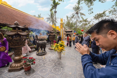 Hanoi, Vietnam, January 2023. the faithful within the Tran Quoc Pagoda, the oldest Buddhist temple in Hanoi, is located on a small island near the southeastern shore of Hanoi's West Lake.のeditorial素材