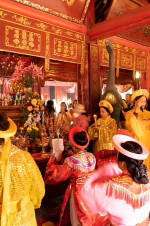 Hanoi, Vietnam, January 2023. the grand ceremony with women in traditional costumes during the new year celebration of the temple of literatureのeditorial素材