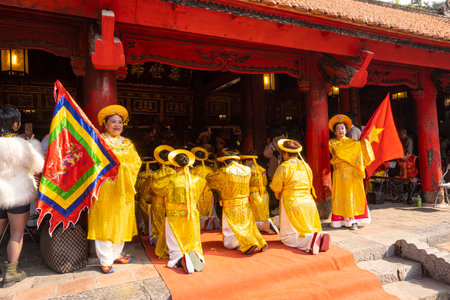 Hanoi, Vietnam, January 2023. the grand ceremony with women in traditional costumes during the new year celebration of the temple of literatureのeditorial素材