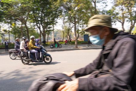Hanoi, Vietnam, January 2023. the traffic of mopeds in the streets of the city centreのeditorial素材