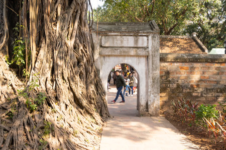Hanoi, Vietnam, January 2023. visitors in the large park with the historic buildings inside the temple of literatureのeditorial素材