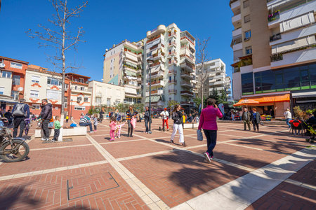 Tirana, Albania. March 2023. people walking in the streets of the city center on a sunny dayのeditorial素材