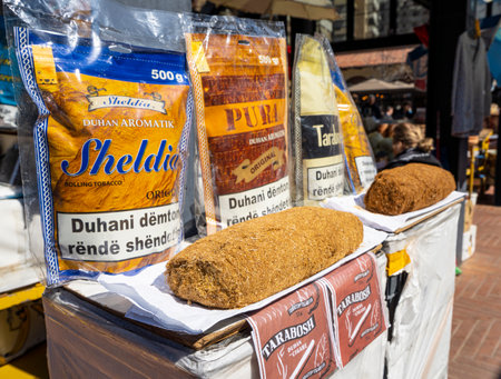 Tirana, Albania. March 2023. selling pouches of tobacco at a stall in an open-air market in the city centreのeditorial素材