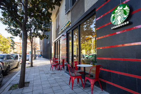 Tirana, Albania. March 2023. The sign of Starbucks brand outdoor of a car in the city centerのeditorial素材