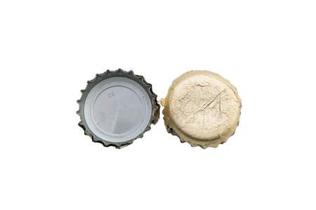 a beer cap on a transparent surfaceの写真素材